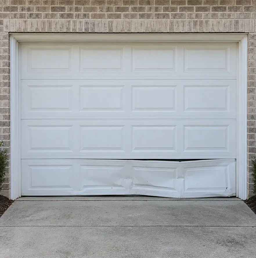 Damaged garage panel